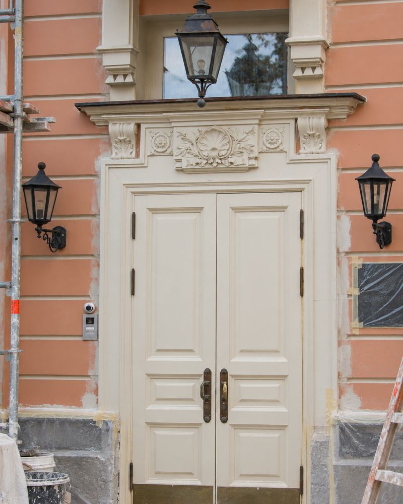Heritage double doors, restored façade during installation