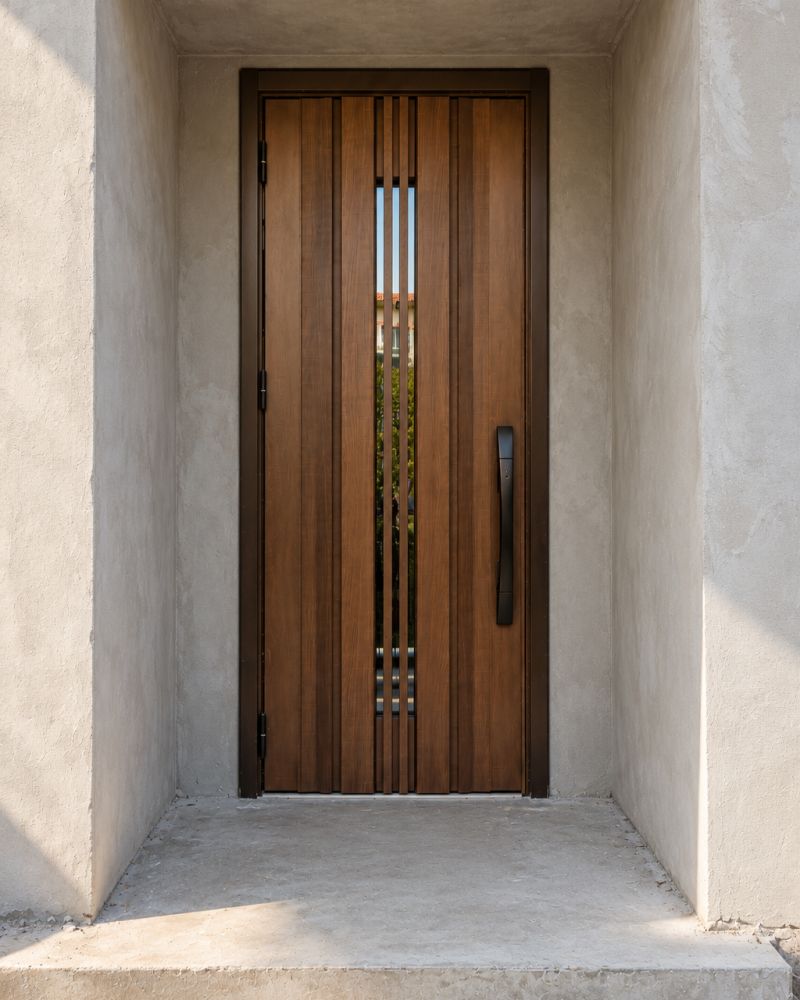 Vertical slatted door during installation