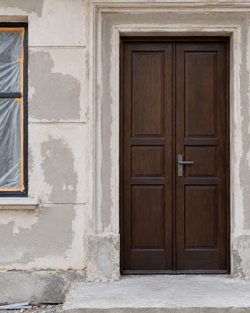 Double door with raised panels during installation